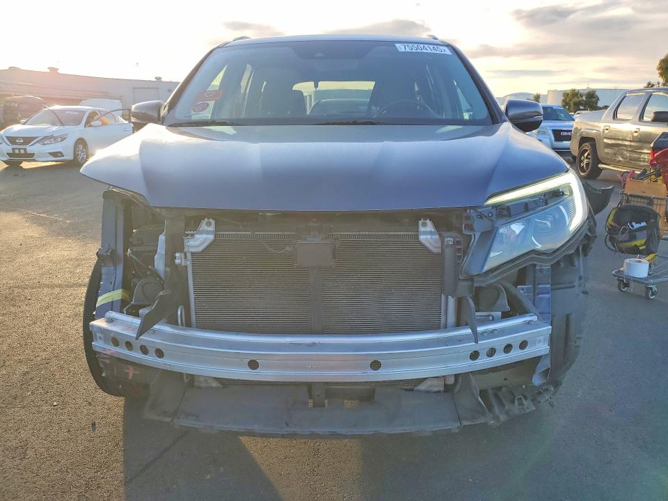 Photo 5 from auction – 2021 HONDA PILOT with VIN 5FNYF5H29MB045336
