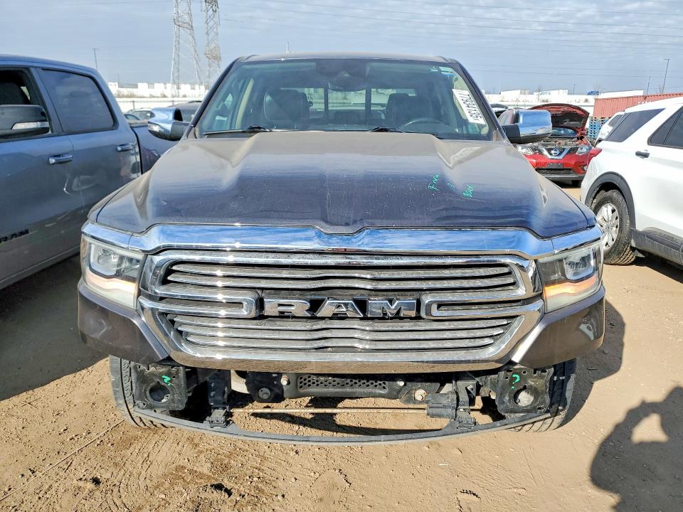 Photo 5 from auction – 2021 RAM 1500 with VIN 1C6SRFJT6MN557943
