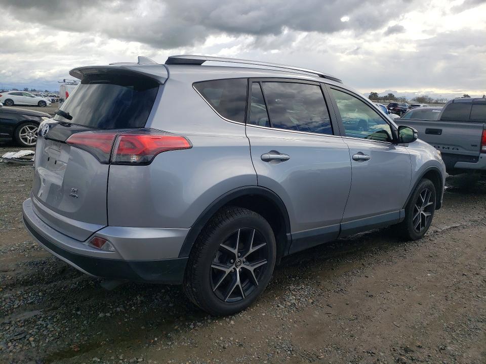 Photo 3 from auction – 2018 TOYOTA RAV4 with VIN JTMJFREV6JD239915