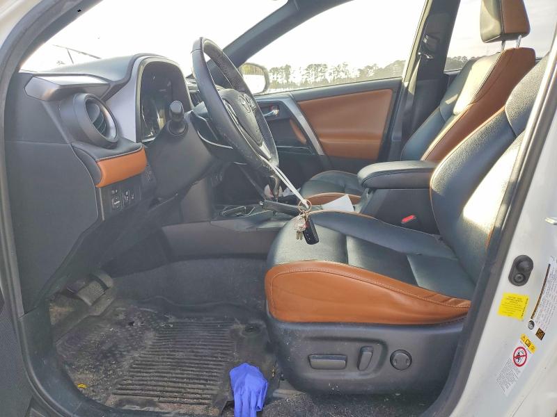 Photo 7 from auction – 2018 TOYOTA RAV4 with VIN JTMNFREV5JJ152798