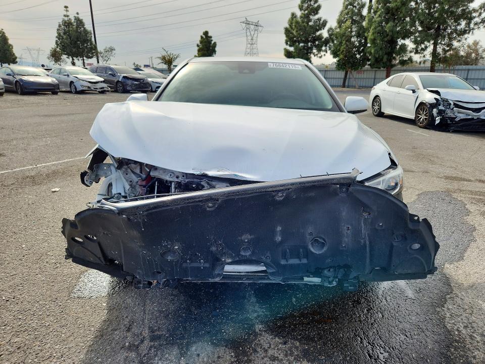 Photo 5 from auction – 2022 TOYOTA CAMRY with VIN 4T1C11AK5NU661003