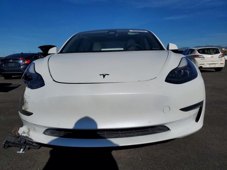 Photo 5 from auction – 2022 TESLA MODEL 3 with VIN 5YJ3E1EA2NF342662