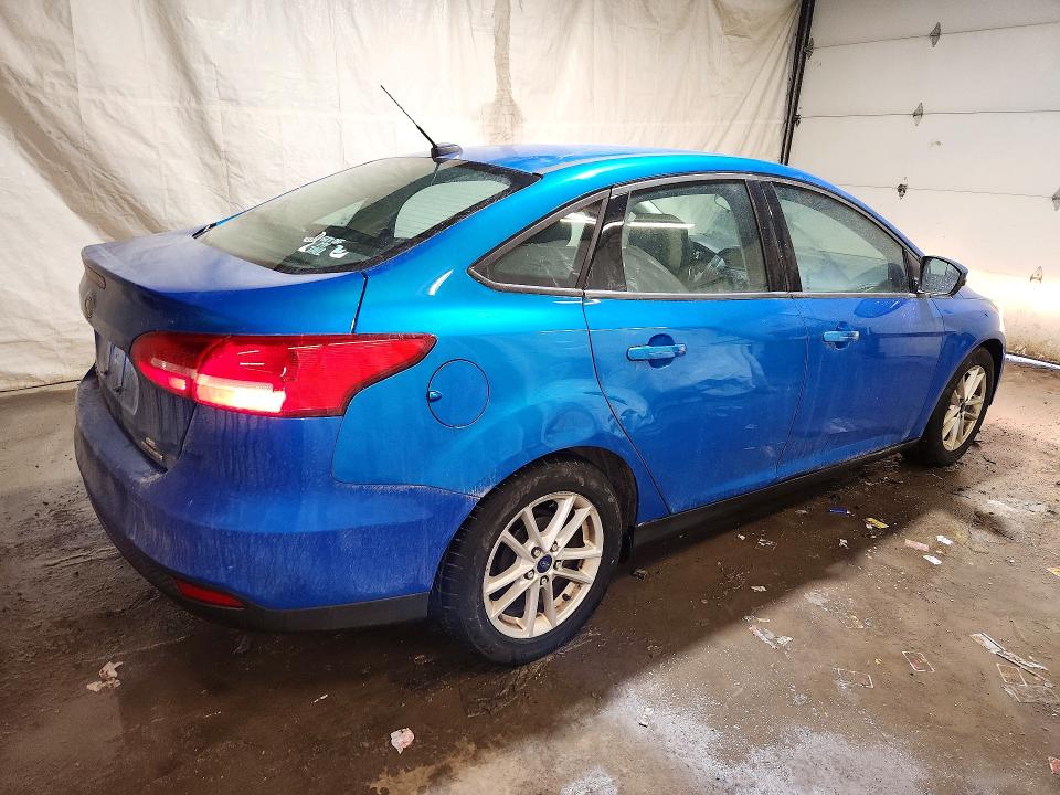 Photo 3 from auction – 2016 FORD FOCUS SE with VIN 1FADP3F29GL377397