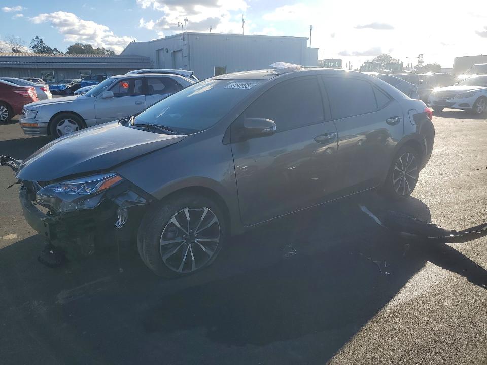 TOYOTA COROLLA 2018 with VIN 2T1BURHE4JC991874 - Photo from auction