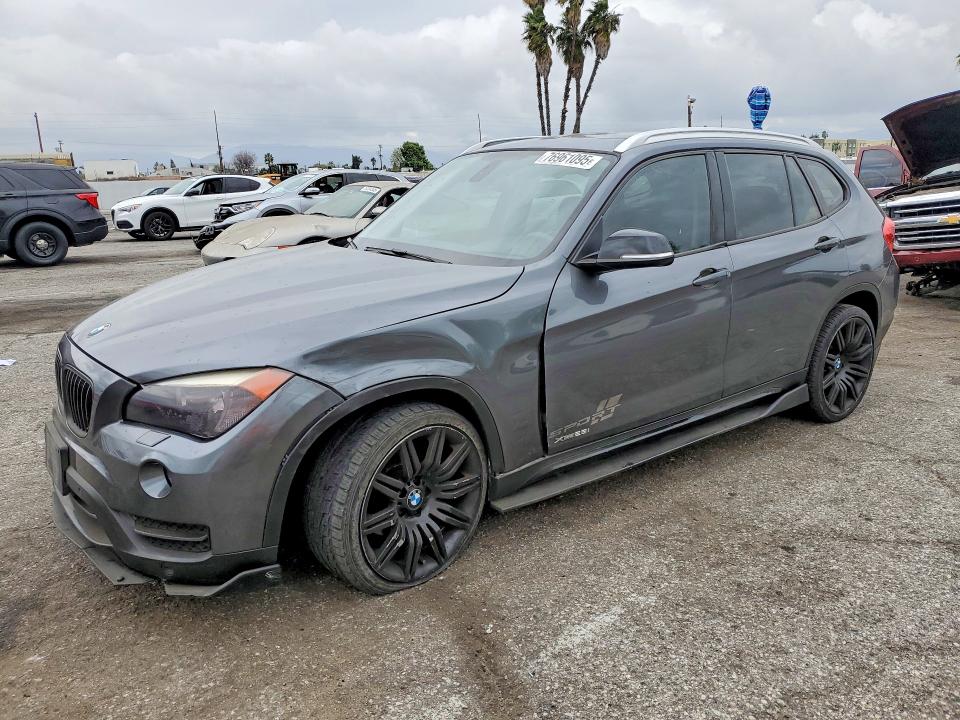 BMW X1 2014 with VIN WBAVL1C58EVY18559 - Photo from auction
