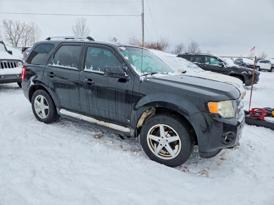 Photo 4 from auction – 2010 FORD ESCAPE LIM with VIN 1FMCU9EG6AKD13423