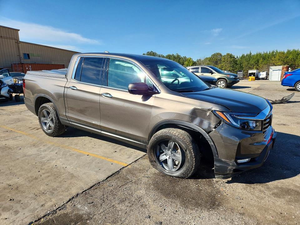 Photo 4 from auction – 2022 HONDA RIDGELINE with VIN 5FPYK3F72NB012766