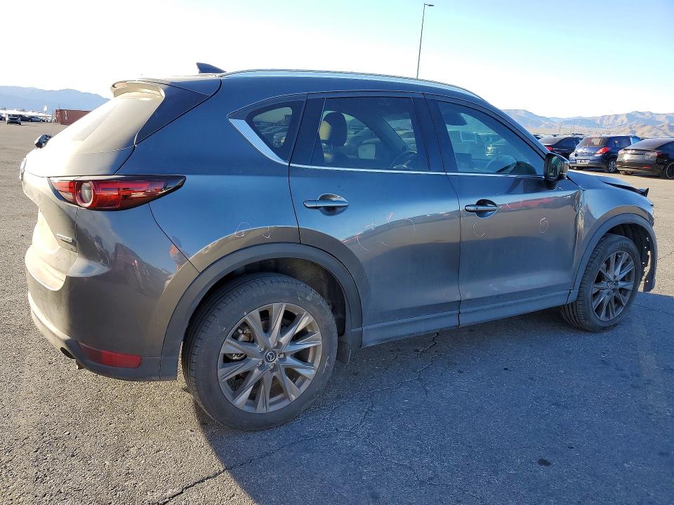 Photo 3 from auction – 2021 MAZDA CX-5 with VIN JM3KFADM5M1342349