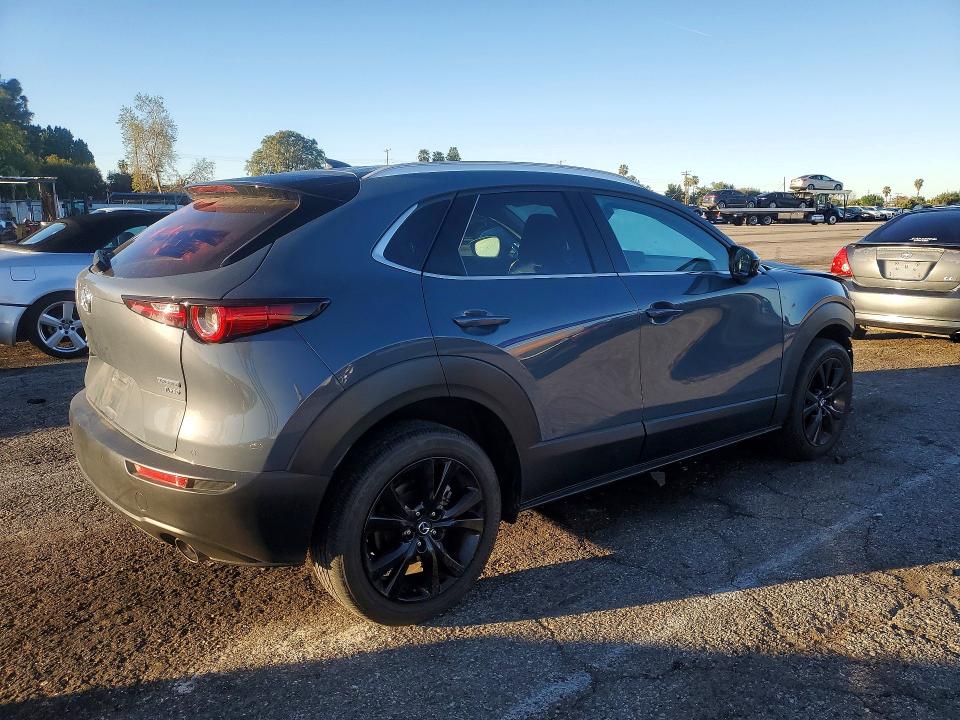 Photo 3 from auction – 2022 MAZDA CX-30 with VIN 3MVDMBEY3NM442838