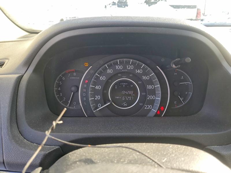 Photo 9 from auction – 2015 HONDA CR-V with VIN 2HKRM4H5XFH102971