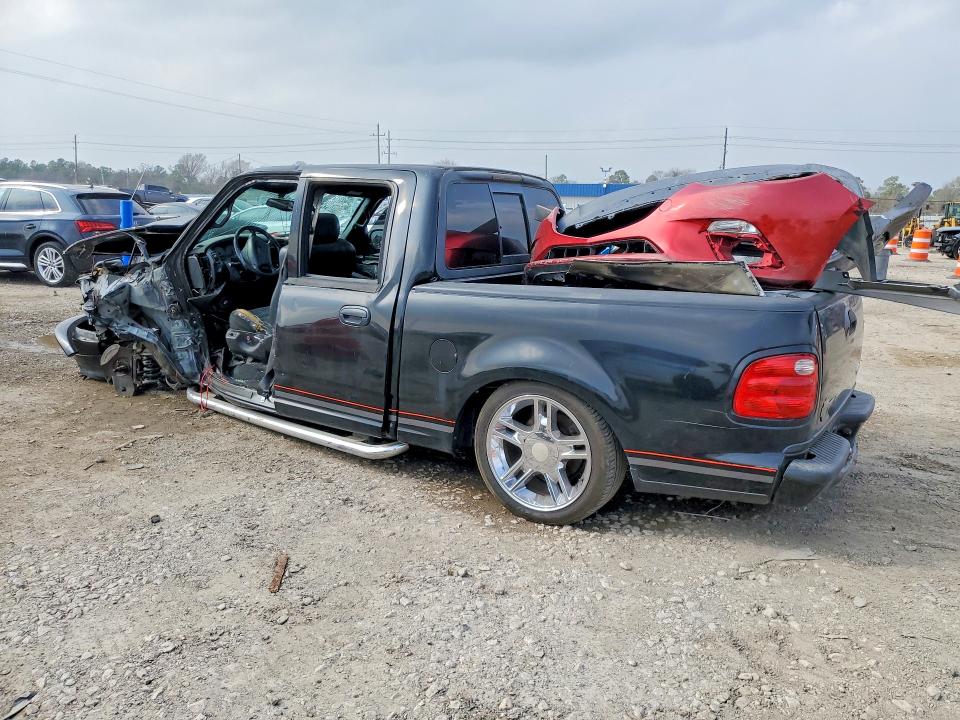 Photo 2 from auction – 2001 FORD F150 with VIN 1FTRW07L01KB66935