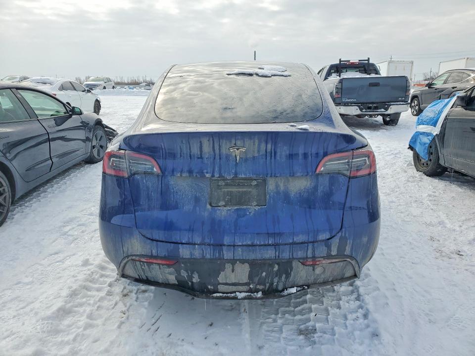 Photo 6 from auction – 2023 TESLA MODEL Y with VIN LRWYGDFD1PC227087