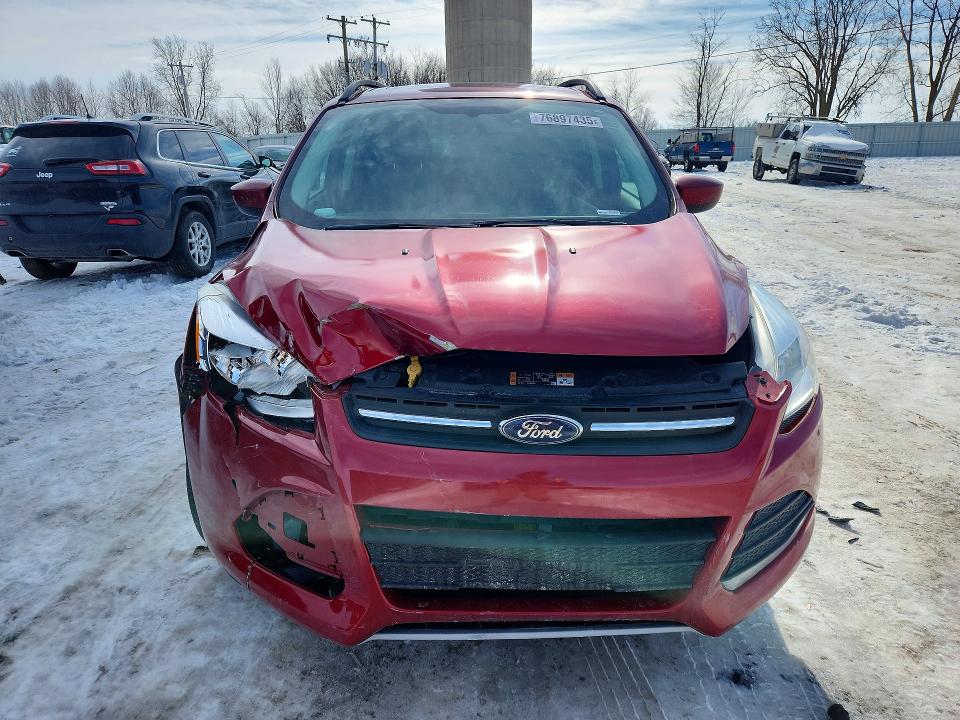 Photo 5 from auction – 2016 FORD ESCAPE with VIN 1FMCU9G92GUC07269