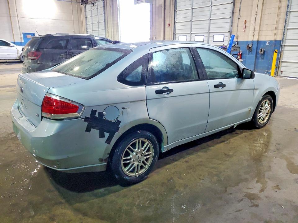 Foto 3 de la subasta – 2009 FORD FOCUS con VIN 1FAHP35N29W178223