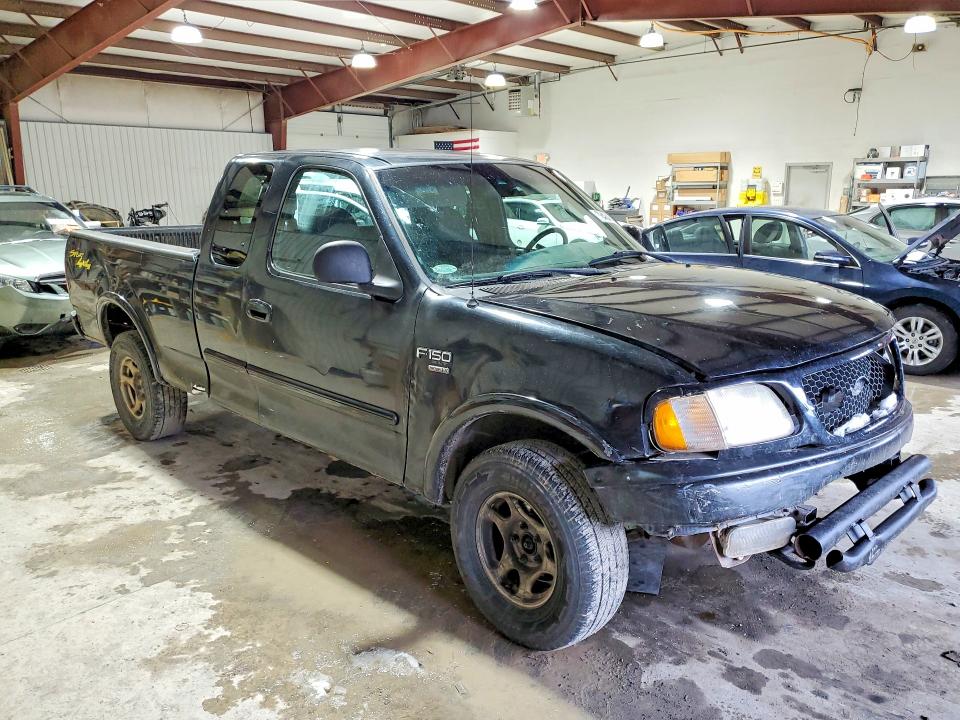Photo 4 from auction – 2001 FORD F150 with VIN 1FTRX18L71NA11895