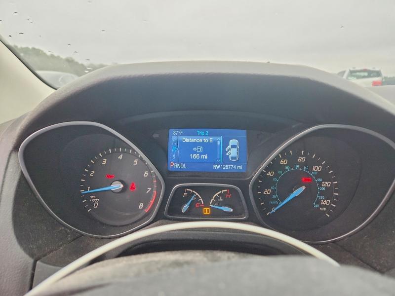 Photo 9 from auction – 2014 FORD FOCUS with VIN 1FADP3F27EL320385