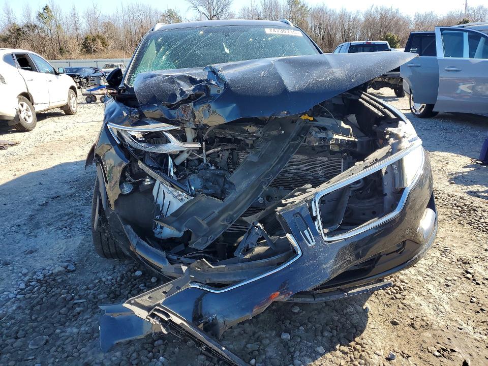 Photo 5 from auction – 2015 LINCOLN MKC with VIN 5LMCJ1A99FUJ24663