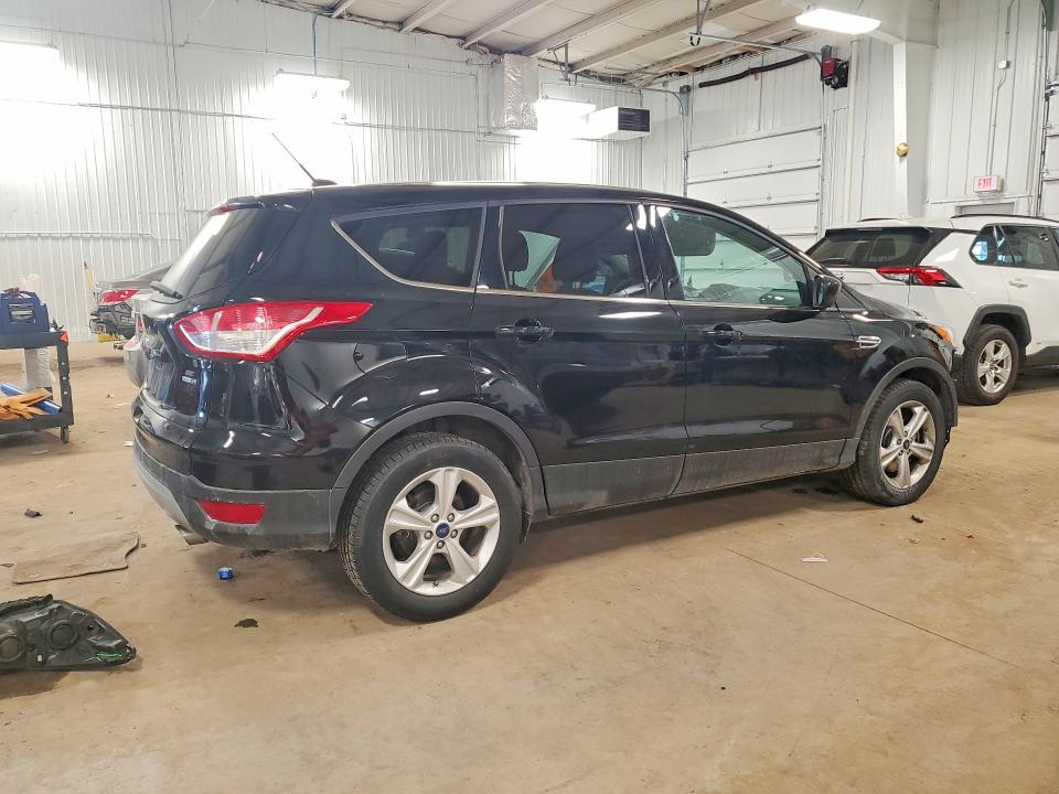 Photo 3 from auction – 2016 FORD ESCAPE with VIN 1FMCU9GX5GUA39383