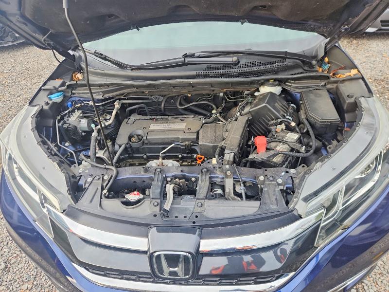 Photo 12 from auction – 2015 HONDA CR-V with VIN 5J6RM3H99FL026050
