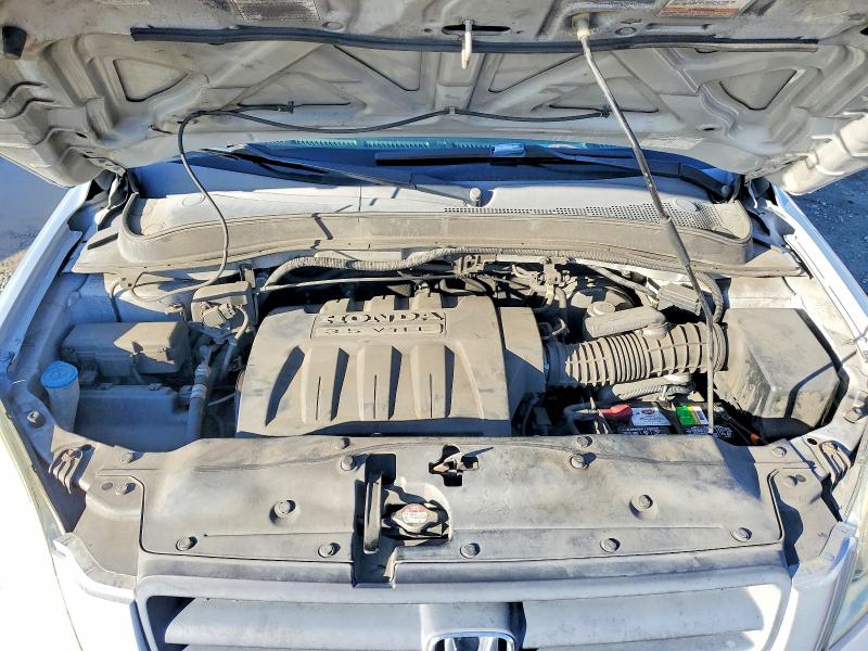 Foto 12 de la subasta – 2005 HONDA PILOT con VIN 2HKYF18575H547798