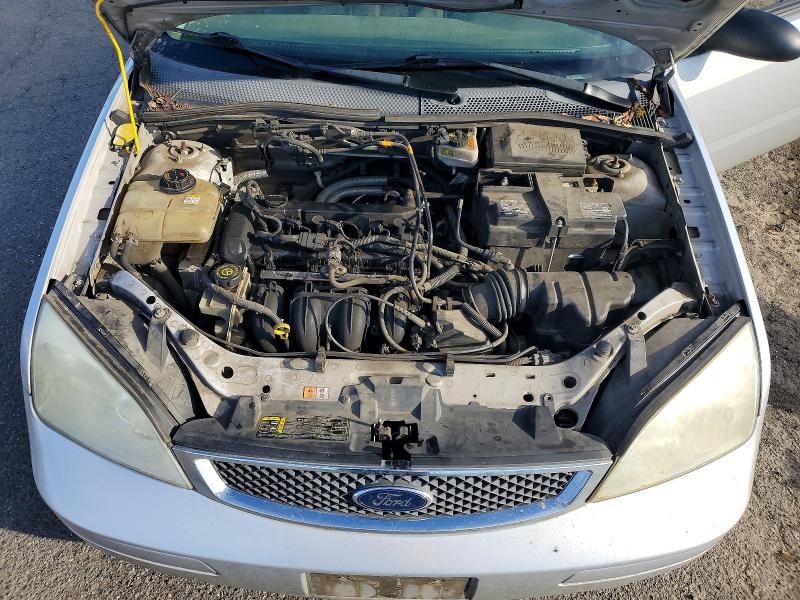 Photo 11 from auction – 2007 FORD FOCUS with VIN 1FAFP31N87W214023