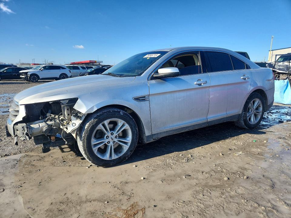 FORD TAURUS 2015 with VIN 1FAHP2E80FG128897 - Photo from auction