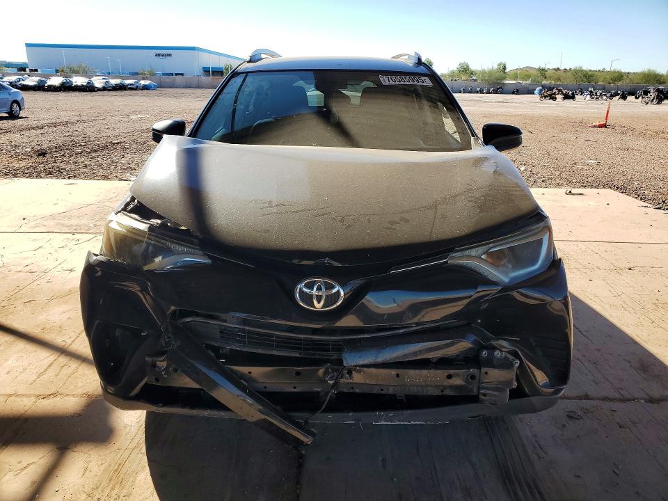 Photo 5 from auction – 2016 TOYOTA RAV4 with VIN 2T3ZFREV4GW310690