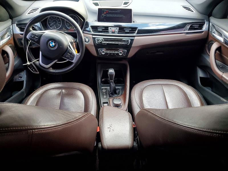 Photo 8 from auction – 2017 BMW X1 with VIN WBXHU7C31H5H32910