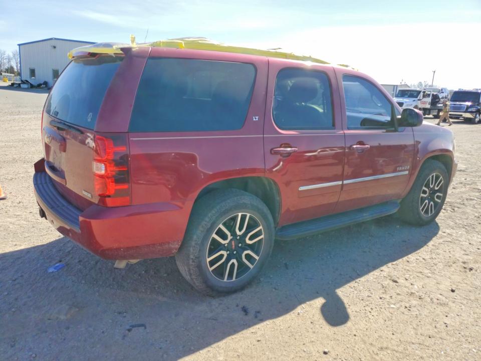 Photo 3 from auction – 2011 CHEVROLET TAHOE with VIN 1GNSCBE06BR165108