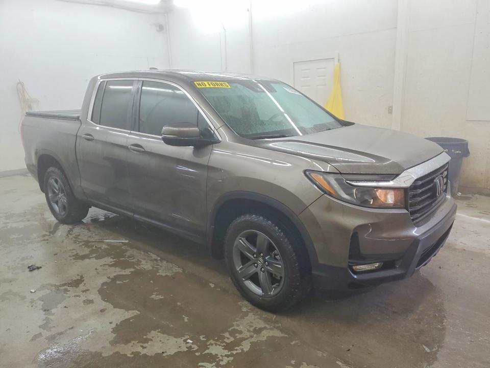 Photo 4 from auction – 2023 HONDA RIDGELINE with VIN 5FPYK3F59PB004441