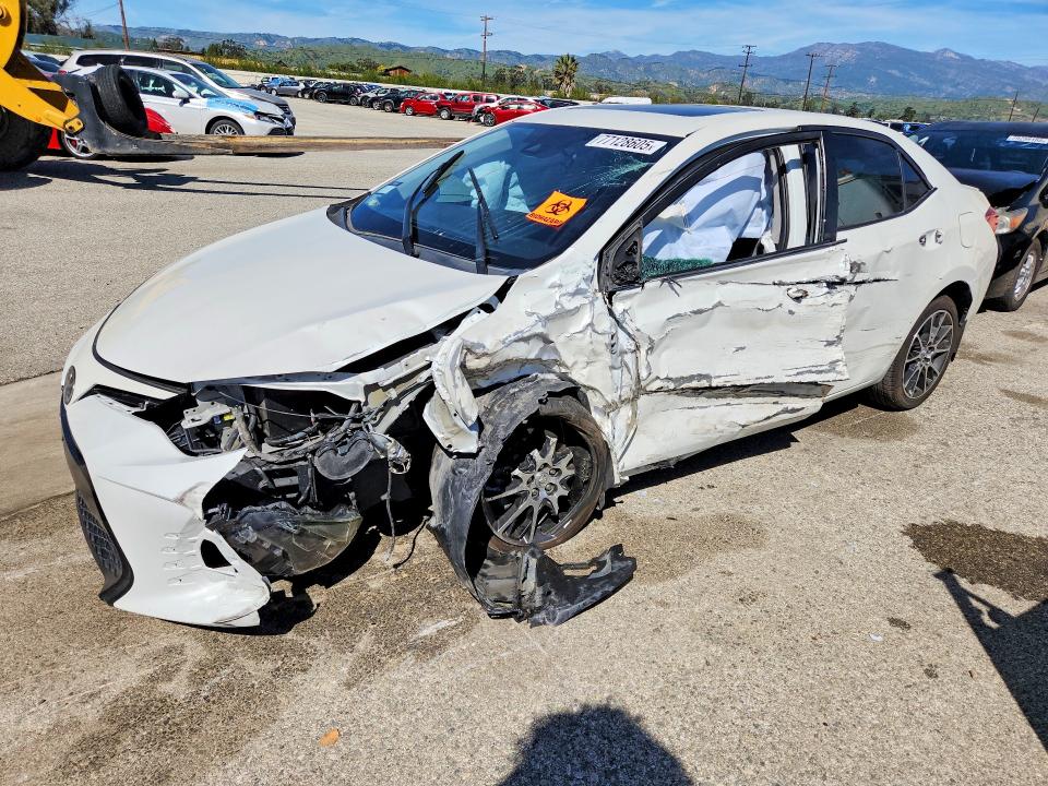 TOYOTA COROLLA 2017 with VIN 5YFBURHE3HP611451 - Photo from auction