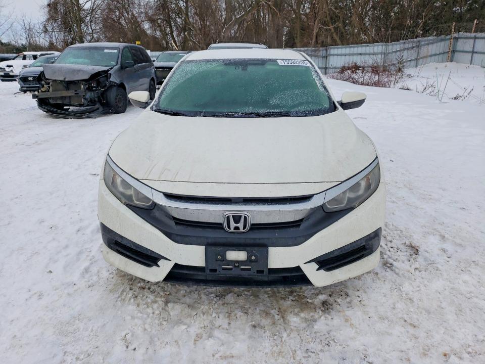 Photo 5 from auction – 2018 HONDA CIVIC LX with VIN 2HGFC2E50JH009930