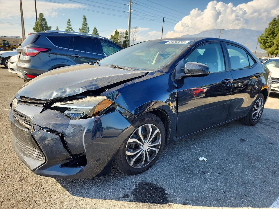TOYOTA COROLLA 2018 with VIN 5YFBURHE9JP807514 - Photo from auction