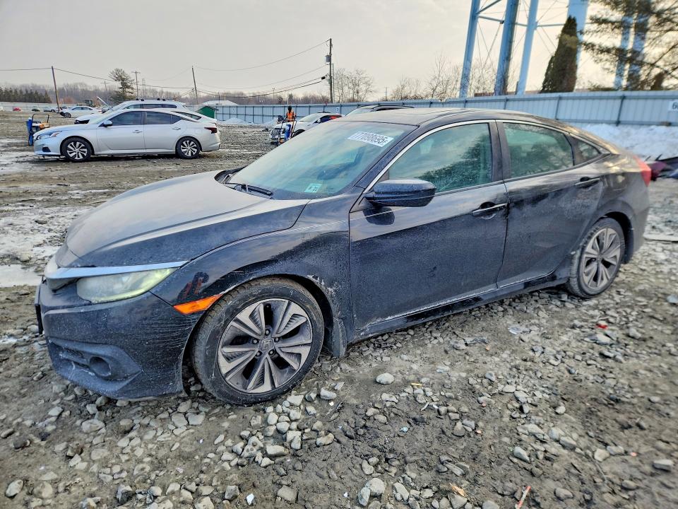 HONDA CIVIC EXL 2016 z numerem VIN 2HGFC1F76GH652530 - Zdjęcie z aukcji