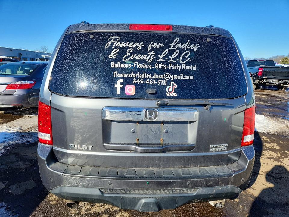 Photo 6 from auction – 2012 HONDA PILOT TOUR with VIN 5FNYF4H93CB010944
