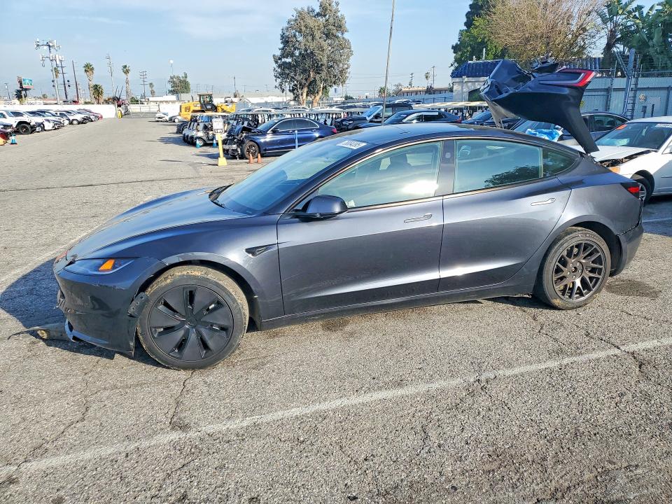 TESLA MODEL 3 2024 with VIN 5YJ3E1EAXRF865031 - Photo from auction