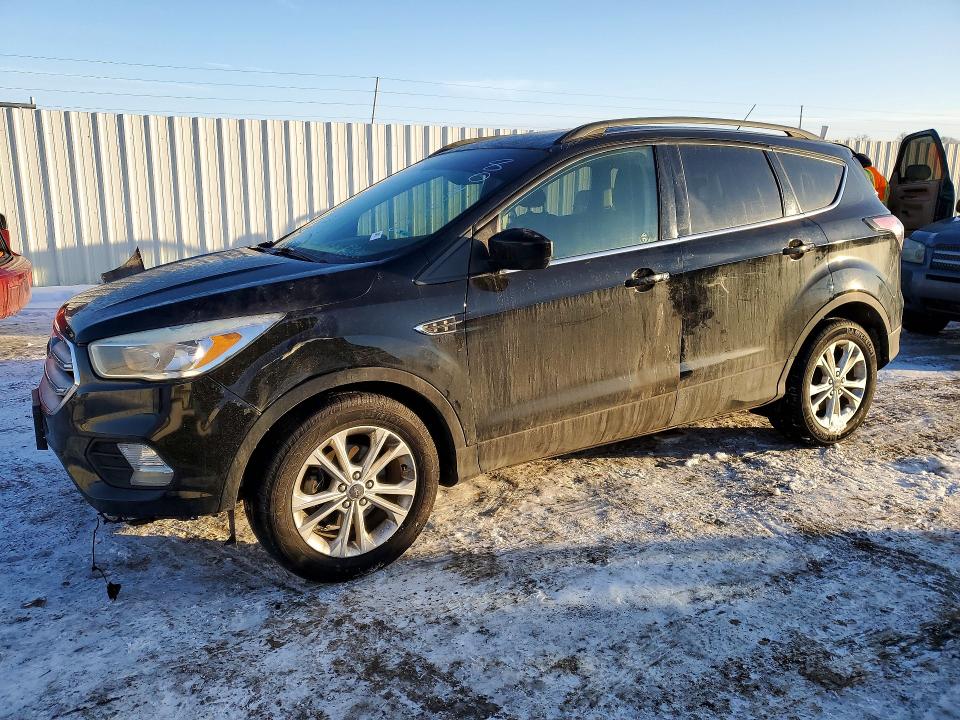 FORD ESCAPE SE 2018 with VIN 1FMCU0GDXJUA80472 - Photo from auction