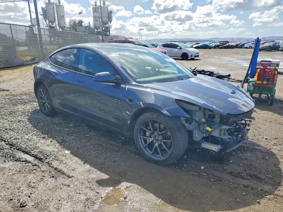 Photo 4 from auction – 2021 TESLA MODEL 3 with VIN 5YJ3E1EA0MF998146