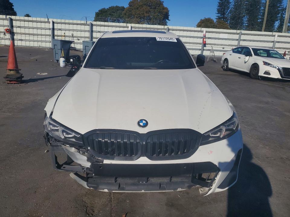 Photo 5 from auction – 2023 BMW 330I with VIN 3MW69FF03P8C79967