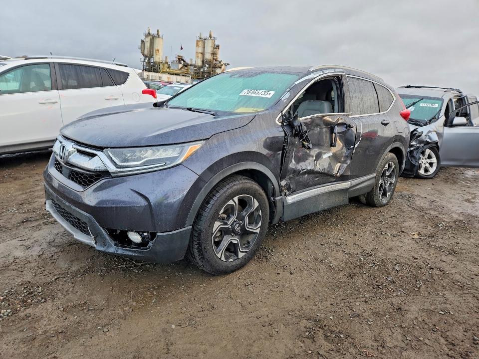 Photo 1 from auction – 2017 HONDA CR-V with VIN 2HKRW1H92HH506961
