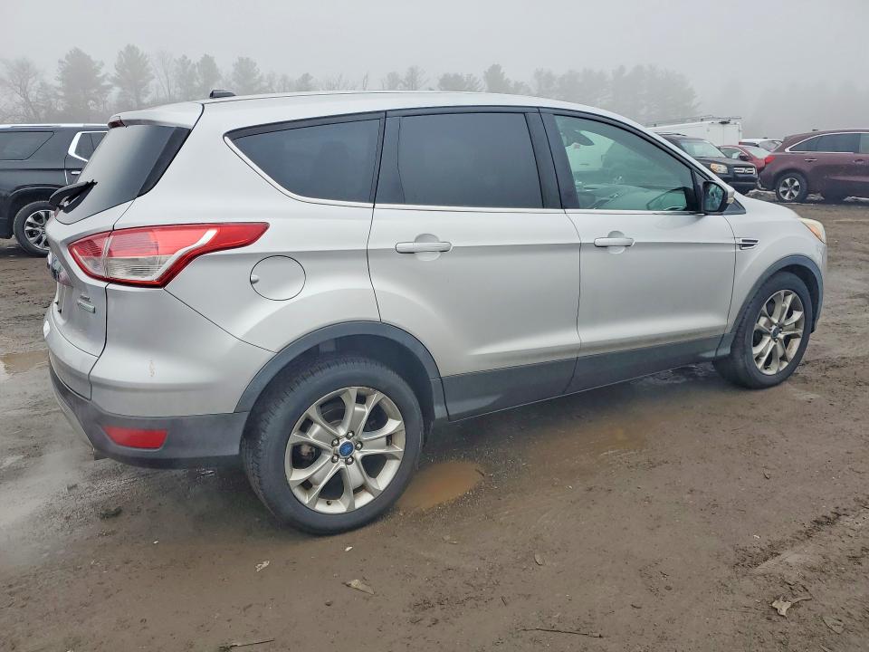 Photo 3 from auction – 2013 FORD ESCAPE with VIN 1FMCU0H96DUA41442