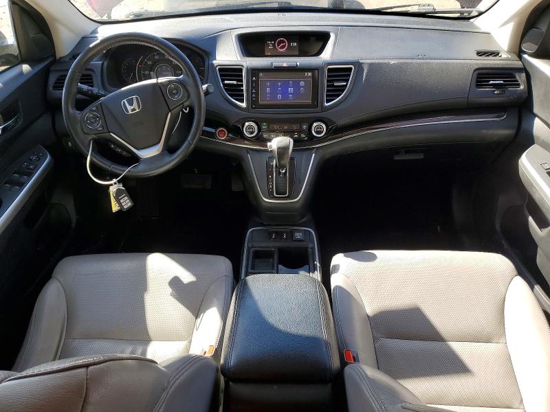 Photo 8 from auction – 2016 HONDA CR-V with VIN 2HKRM3H73GH524416