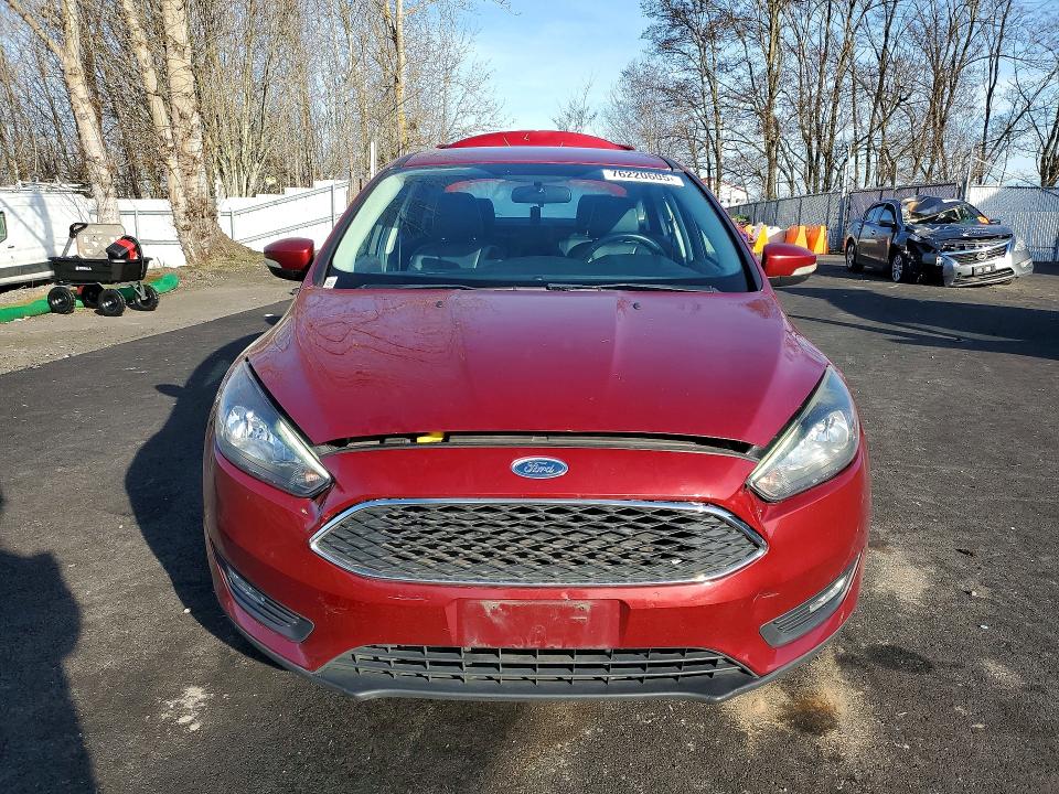 Photo 5 from auction – 2016 FORD FOCUS SE with VIN 1FADP3F22GL340157