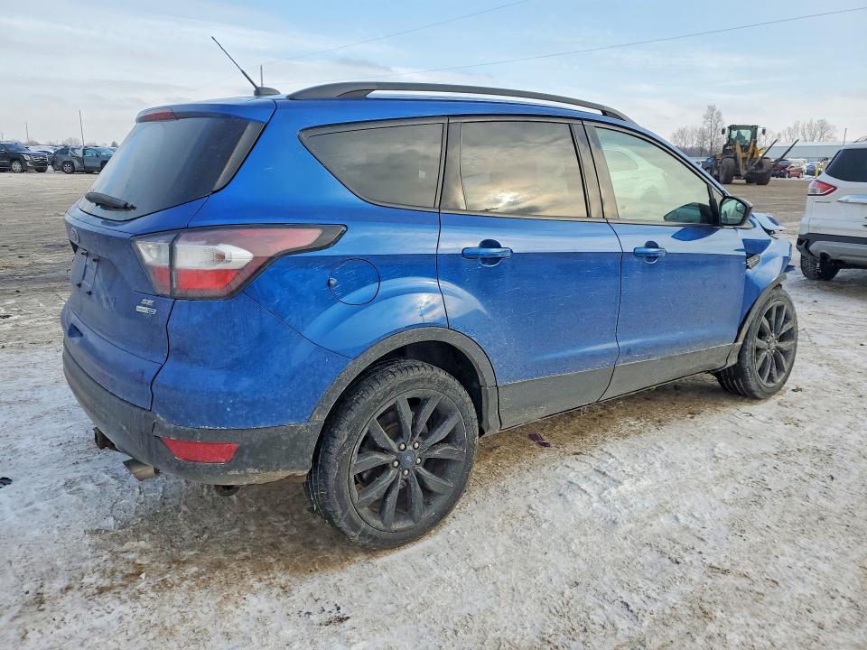 Photo 3 from auction – 2017 FORD ESCAPE SE with VIN 1FMCU9GD1HUD00273