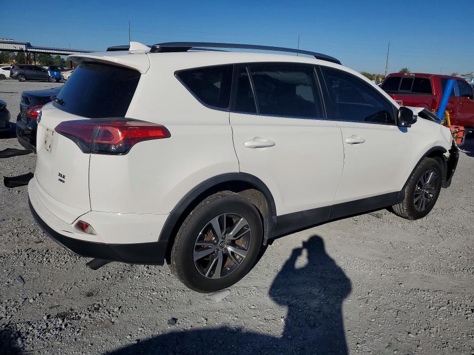 Photo 3 from auction – 2018 TOYOTA RAV4 with VIN 2T3RFREV1JW706227