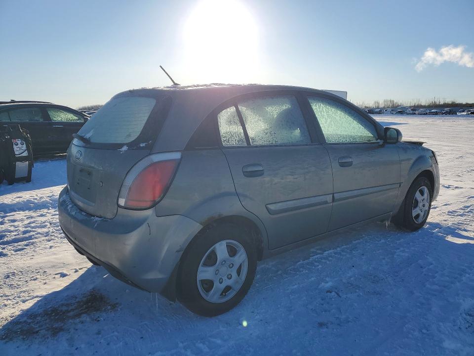 Photo 3 from auction – 2011 KIA RIO BASE with VIN KNADH5B33B6747863