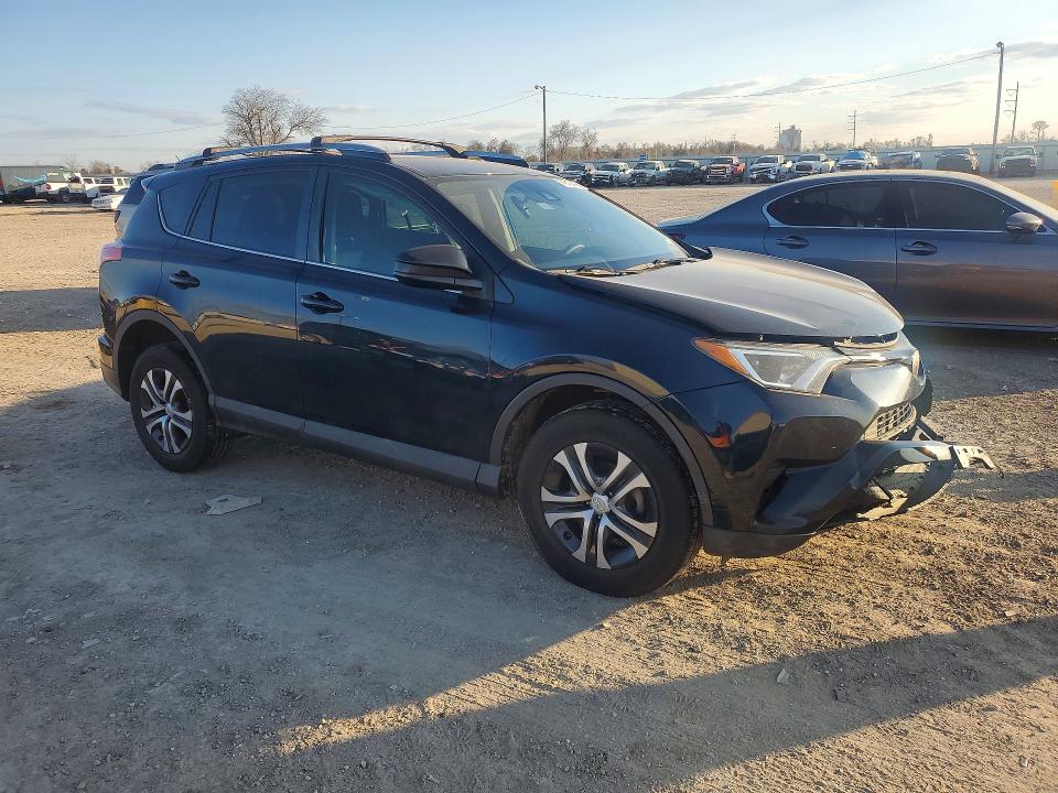 Photo 4 from auction – 2018 TOYOTA RAV4 LE with VIN 2T3ZFREV4JW463917