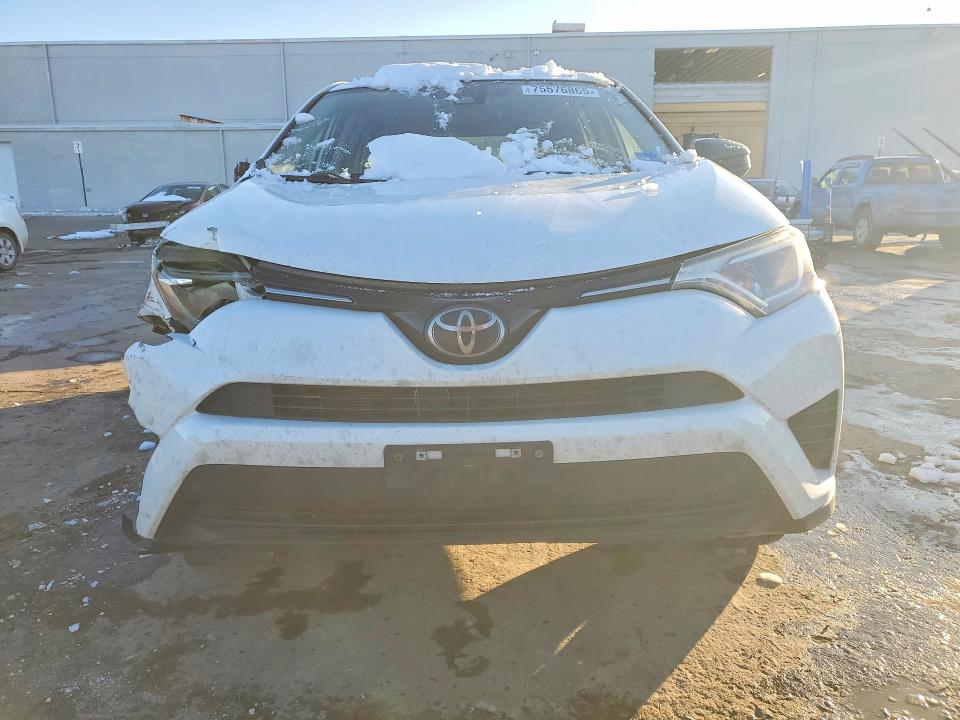 Photo 5 from auction – 2018 TOYOTA RAV4 with VIN JTMBFREV7JJ215774
