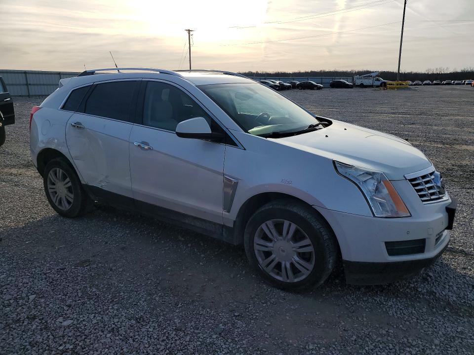 Photo 4 from auction – 2014 CADILLAC SRX with VIN 3GYFNBE31ES651156