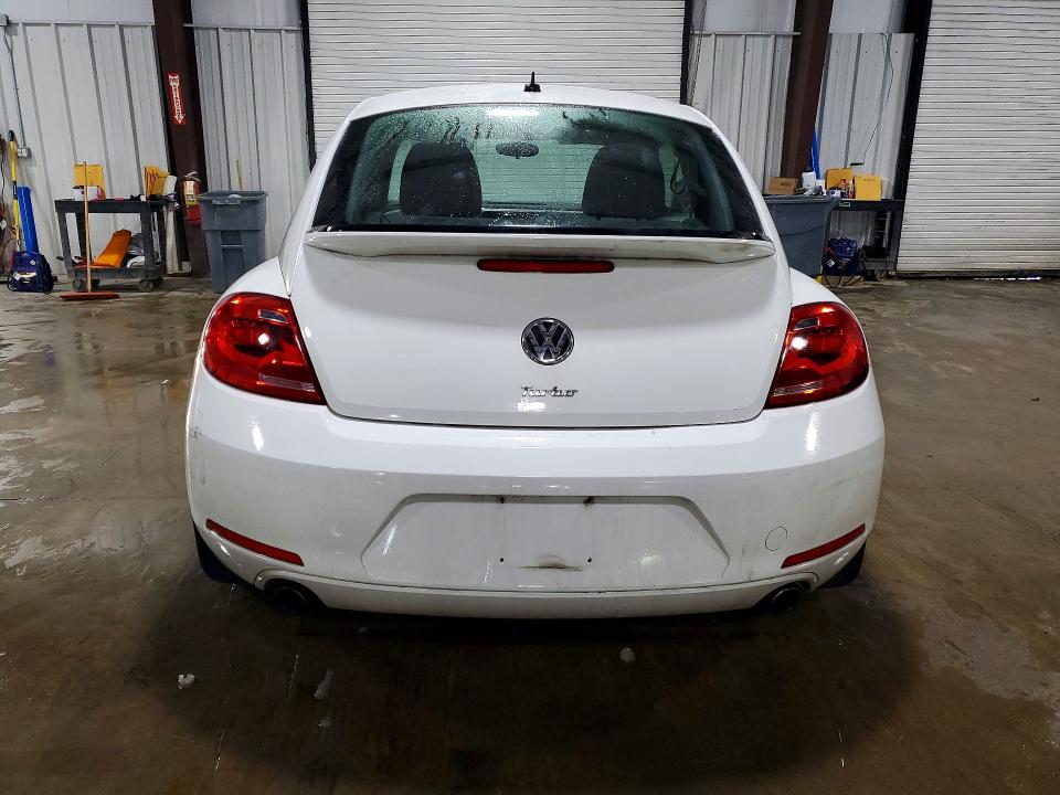 Фото 6 с аукциона – 2012 VOLKSWAGEN BEETLE TUR с VIN 3VWVA7AT9CM604116